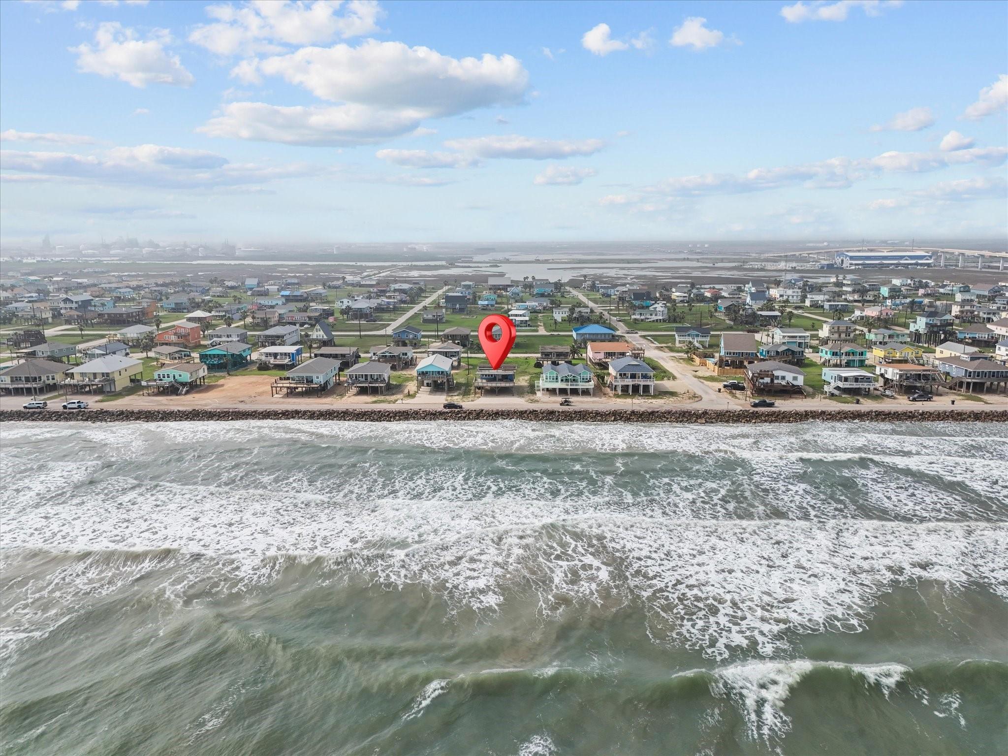 Image 4: This aerial photo showcases a coastal neighborhood