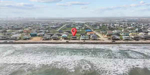 Image 4: This aerial photo showcases a coastal neighborhood