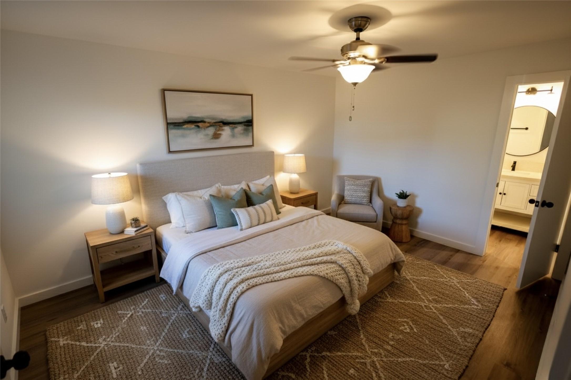 Image 4: The spacious bedroom makes a peaceful retreat. (vi