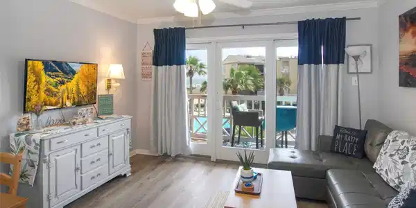 Image 3: Access to private balcony from living space.