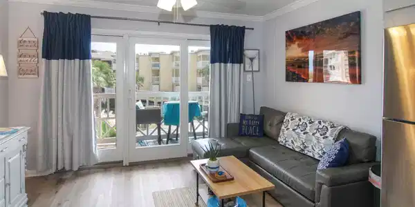 Image 4: Luxury vinyl plank flooring makes sandy feet easie