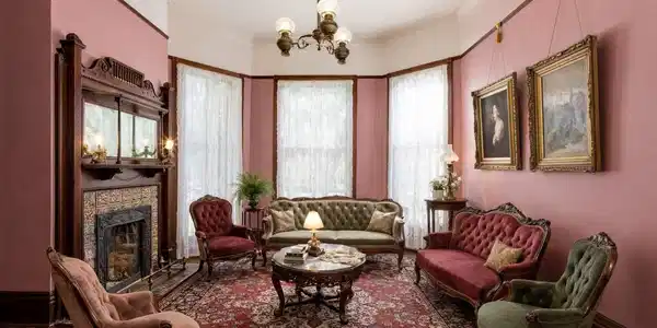 Image 4: Sitting room leading into the formal dinning room.