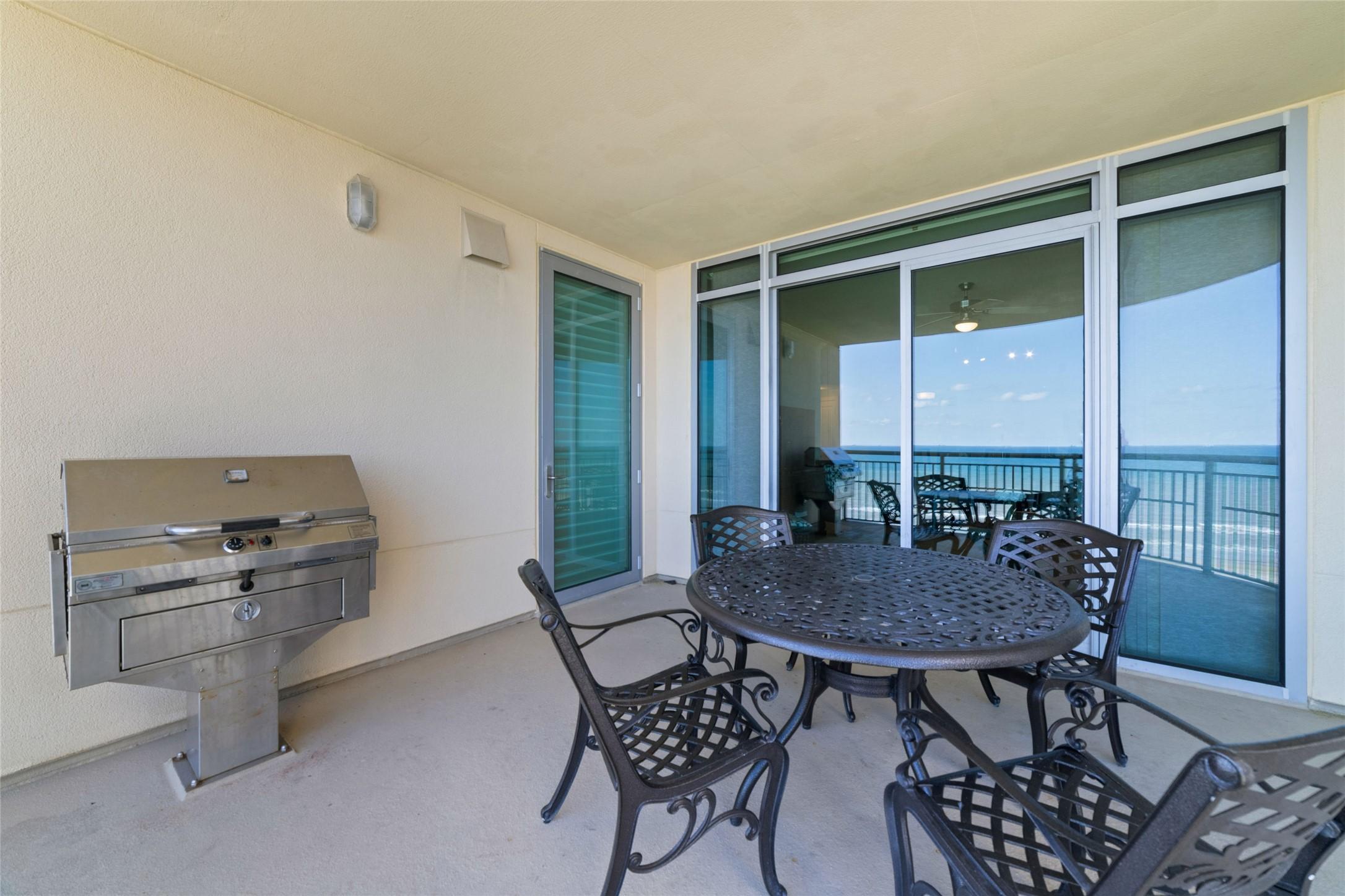 Image 4: Relax in your private balcony with table and chair