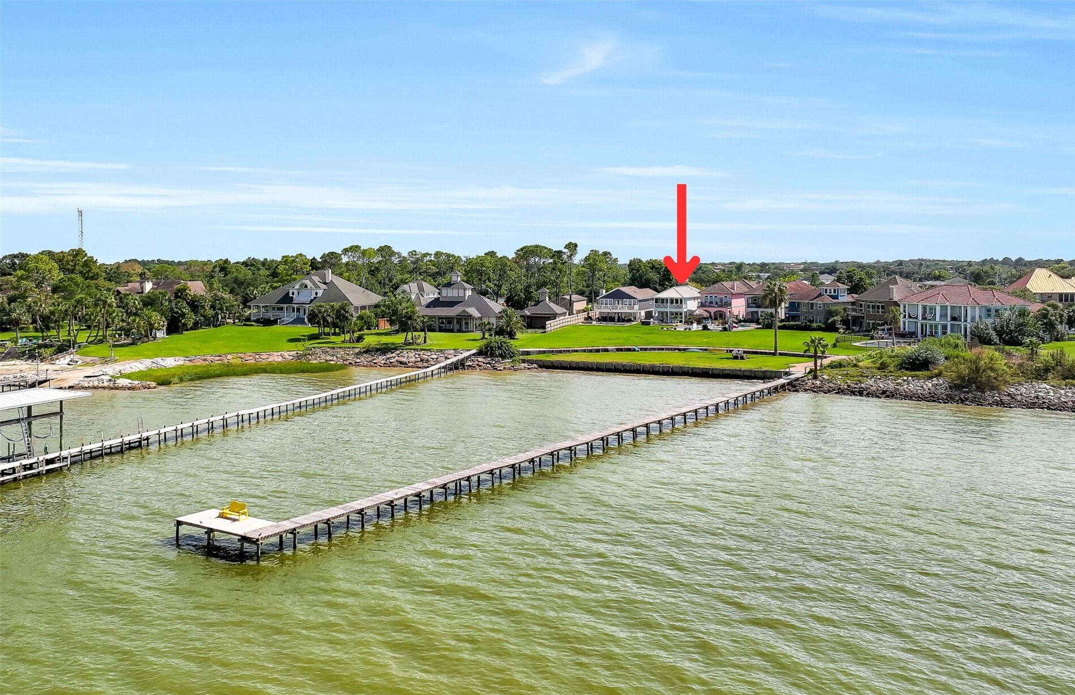 Image 1: Nestled in an intimate gated community of 7 custom