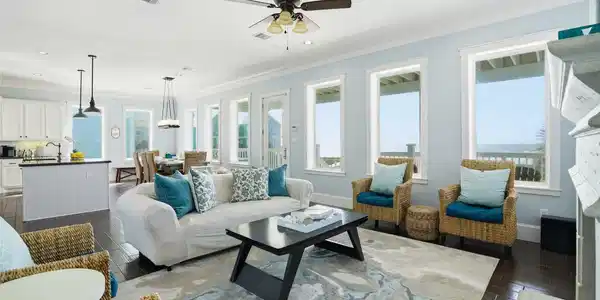 Image 3: Bright and airy living space with large windows of