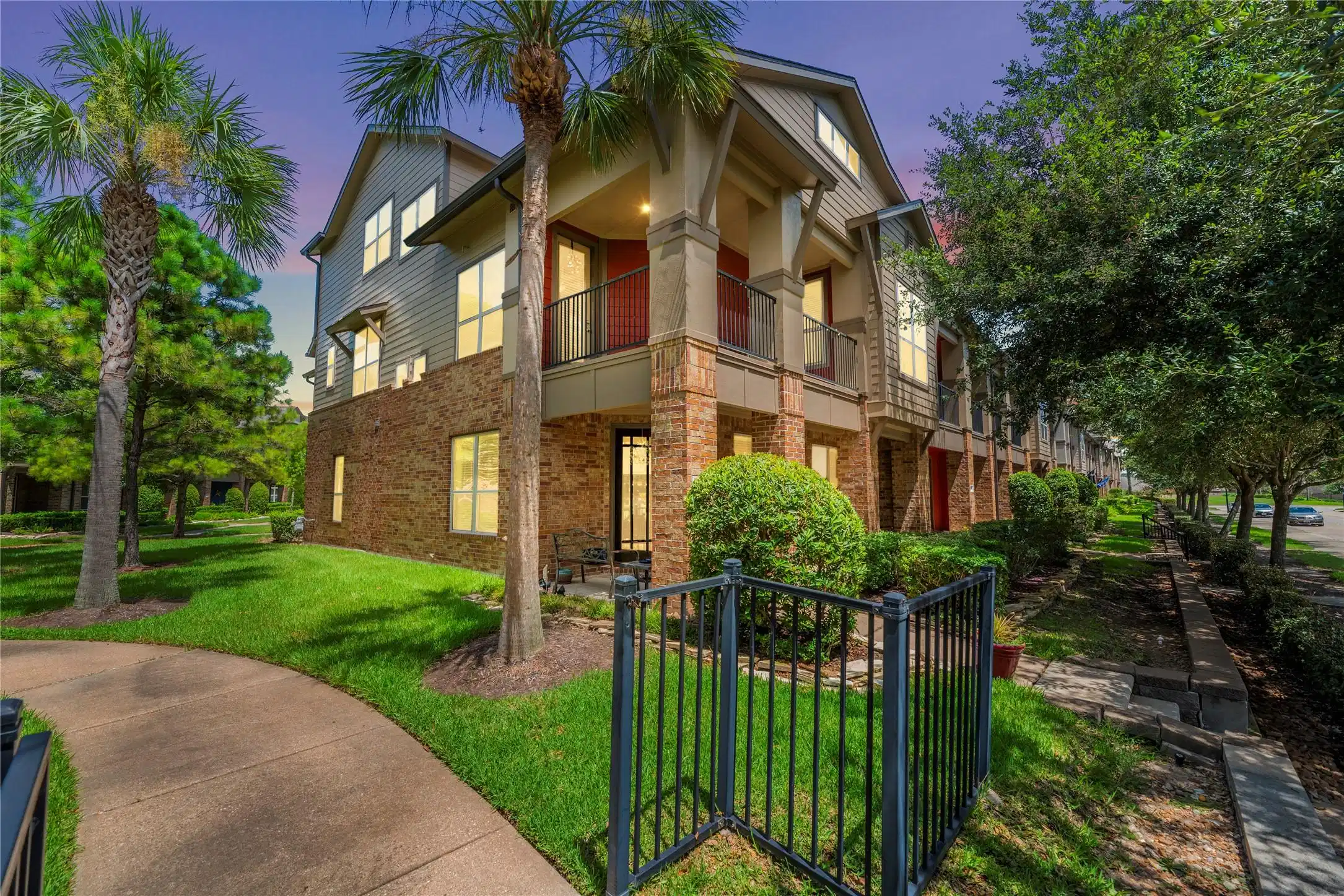 Image 1: Welcome home! This expansive corner unit townhome