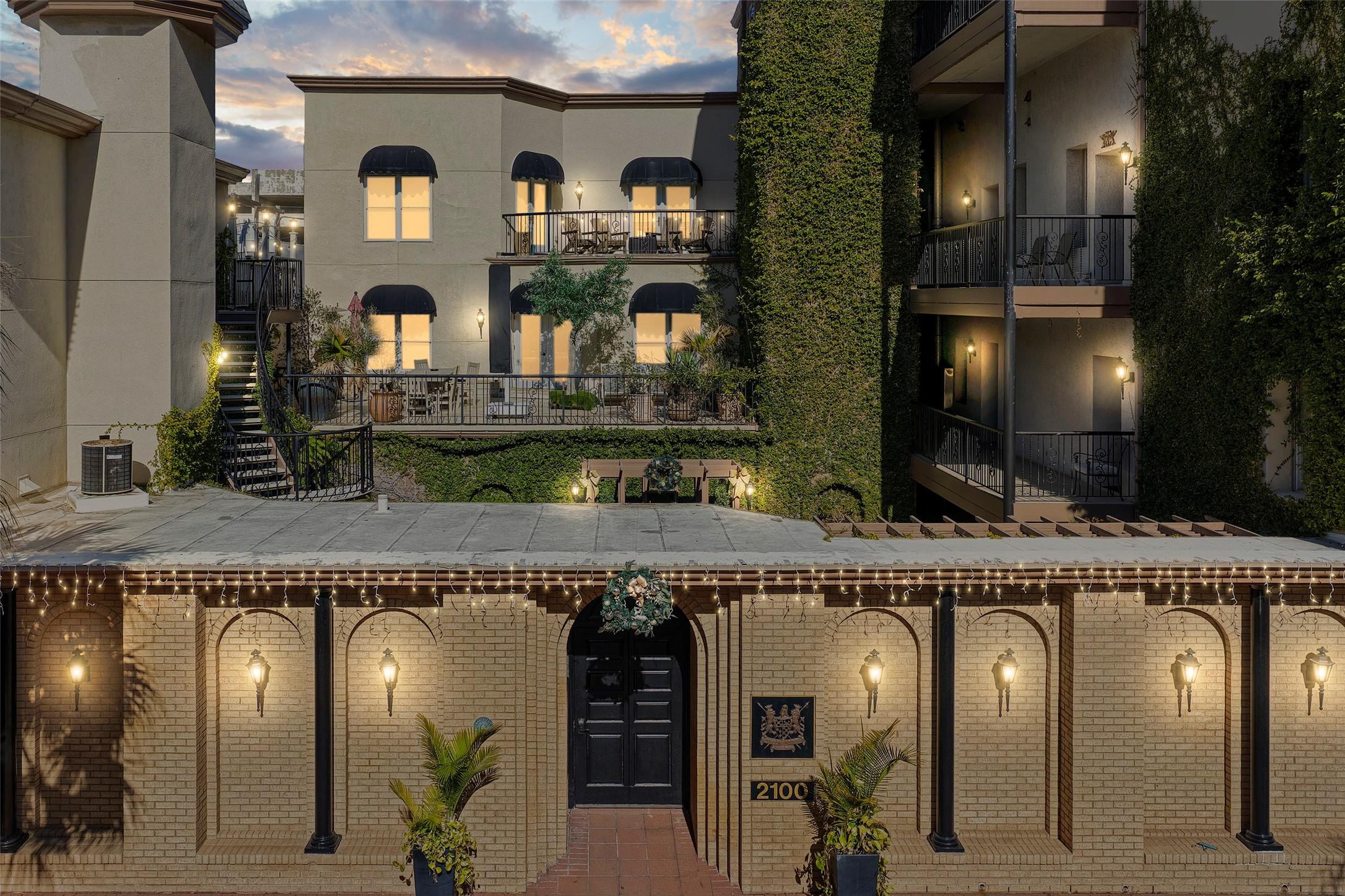 Image 2: Front entry of the unit leading to the courtyard.