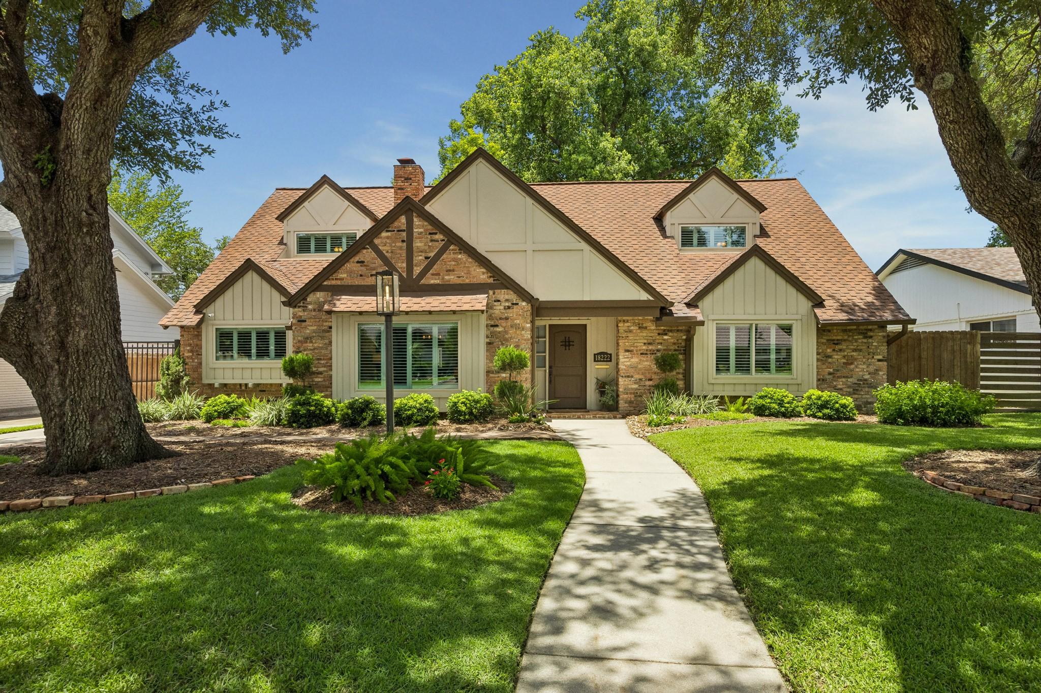 Image 1: Beautiful shade trees, upgraded landscaping, gated