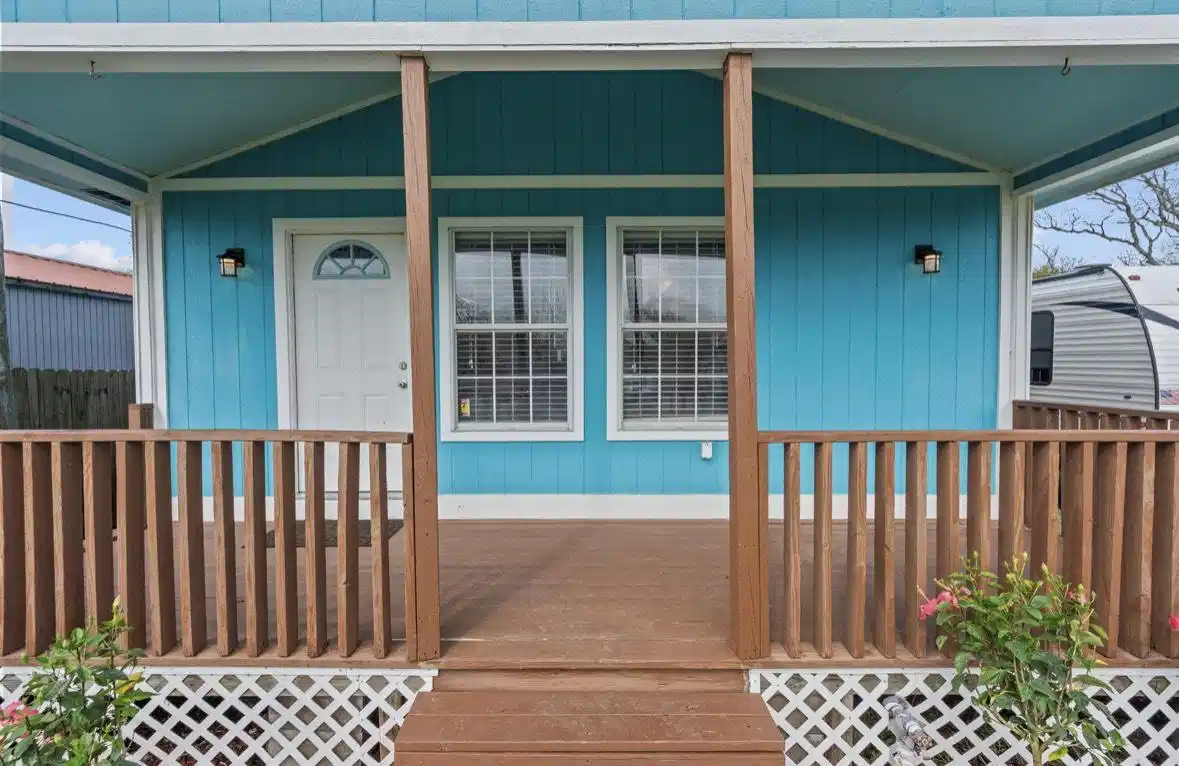 Image 1: Front covered porch to allow for evenings relaxing