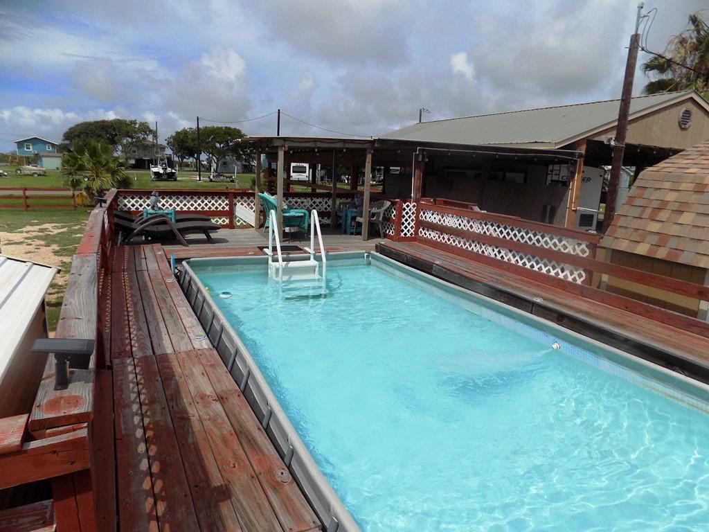 Image 4: Or relax in the pool area (it feels completely sec
