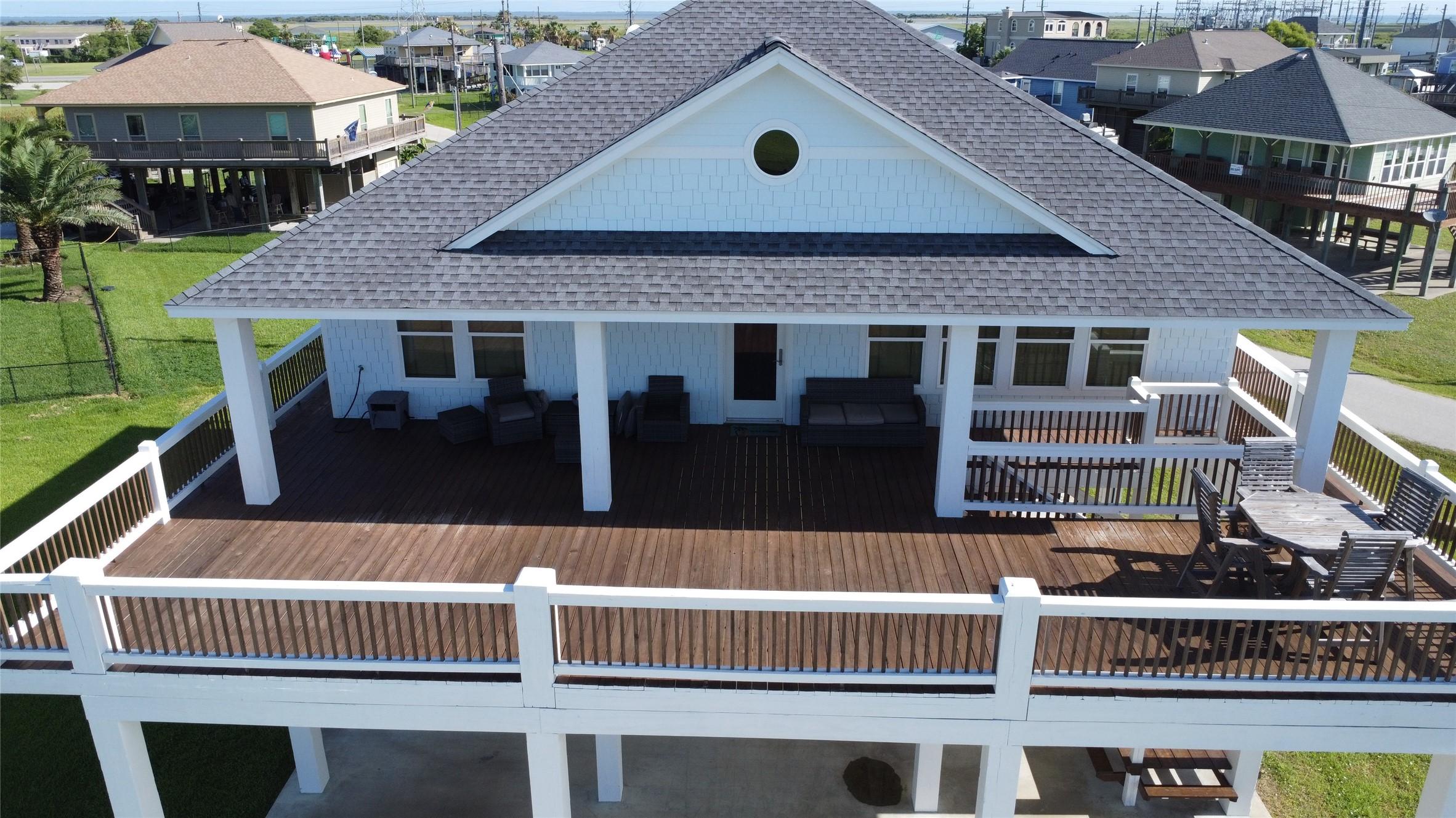 Image 4: Aerial view of oversized, partially covered deck