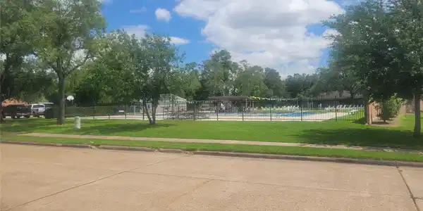 Image 4: Right across the street from community pool!