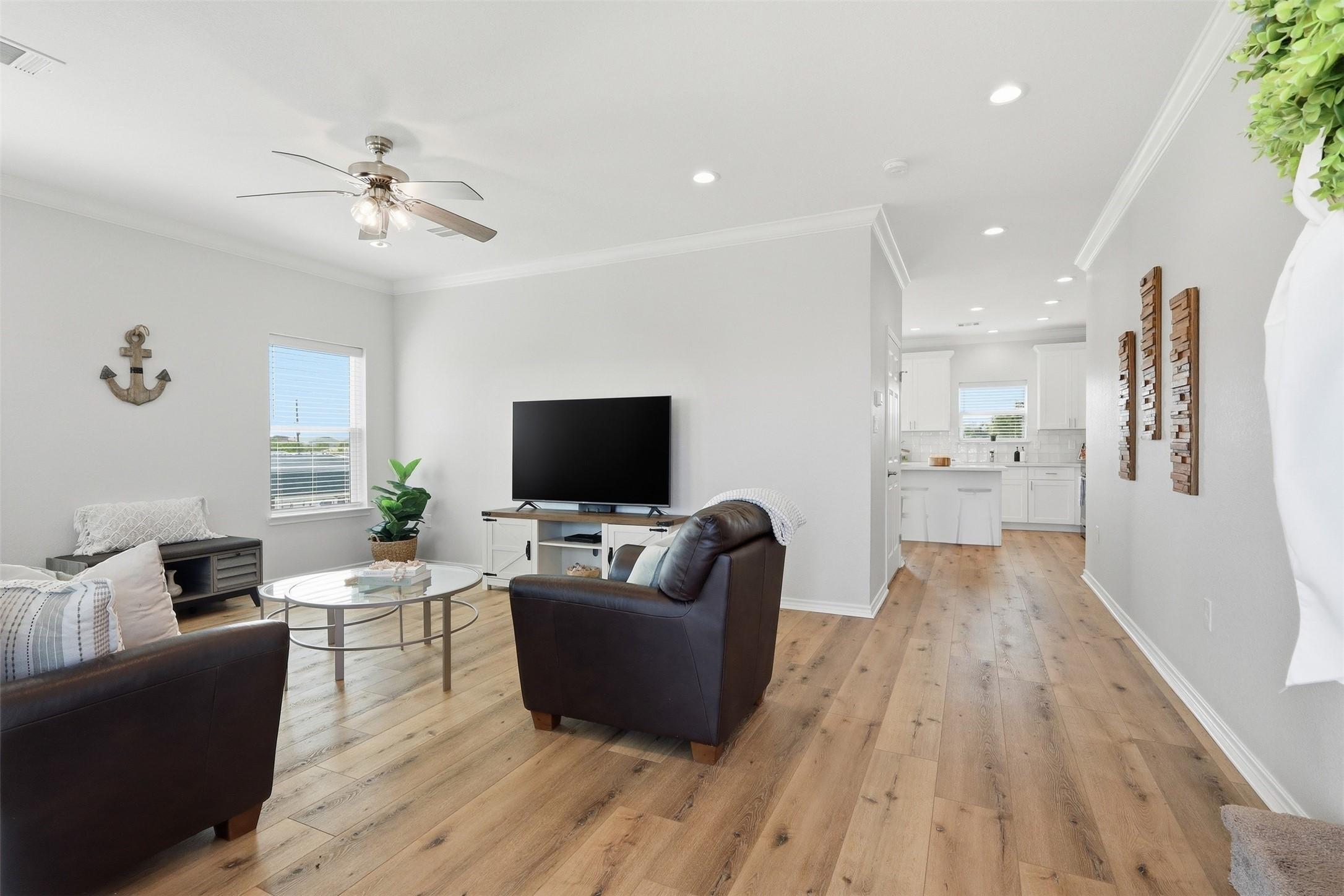 Image 4: Bright and open living area with abundant natural