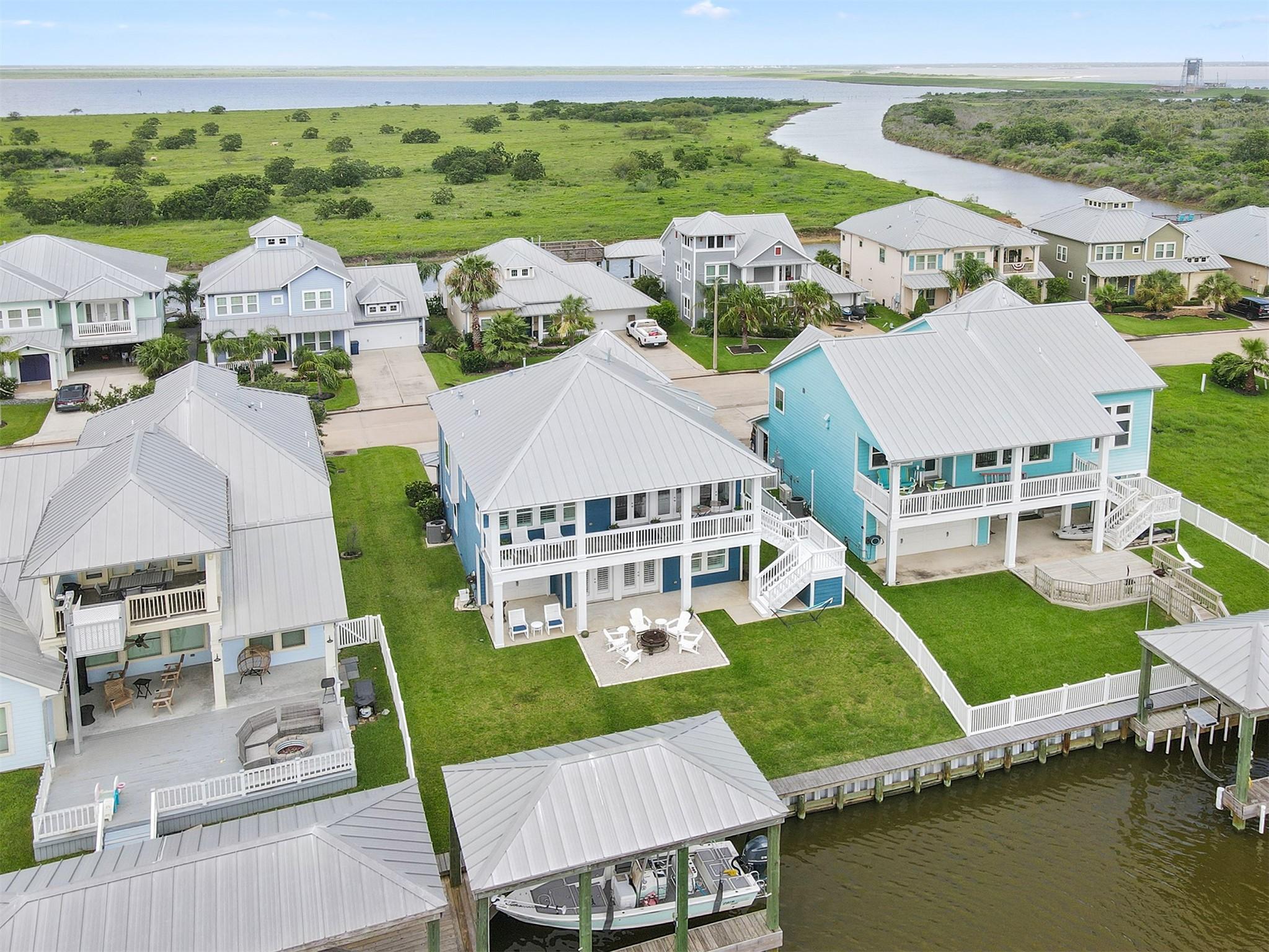 Image 2: Home has a 27' boathouse with a boat lift.