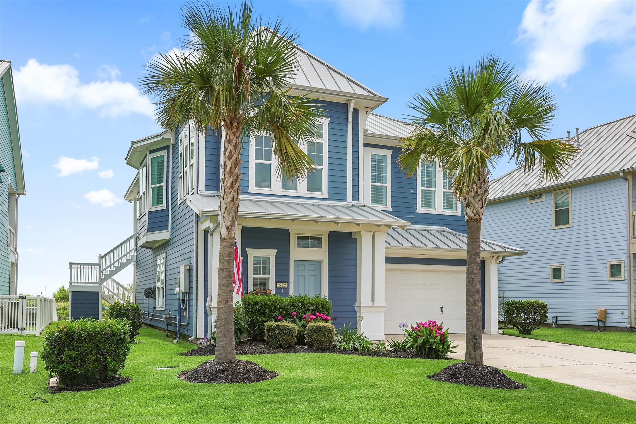 Image 3: Mature landscaping in the front yard.