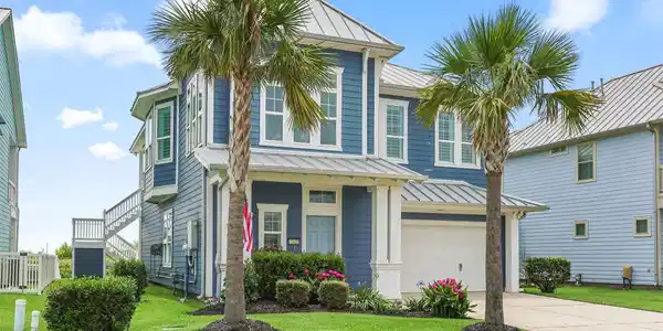 Image 3: Mature landscaping in the front yard.