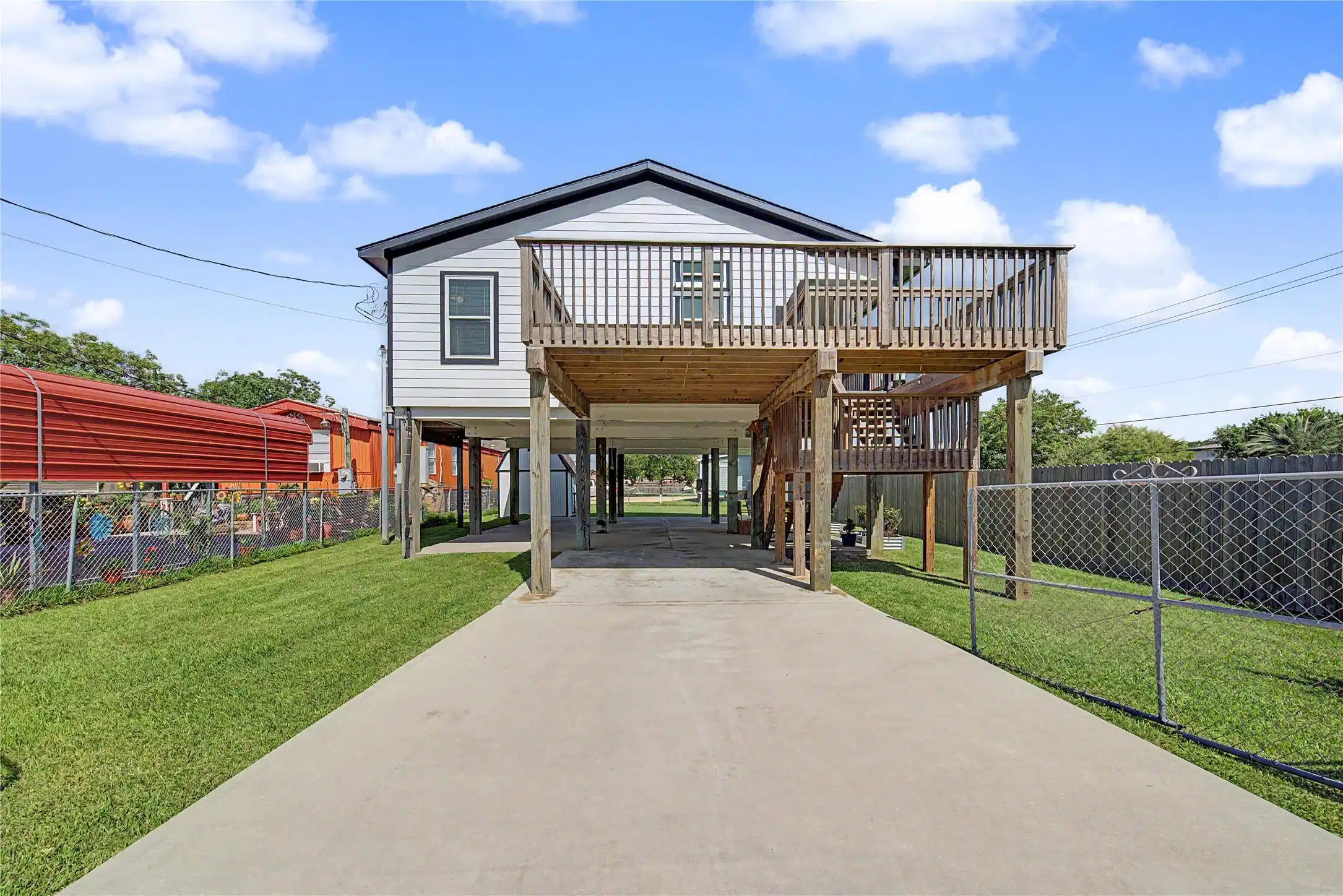 Image 1: Front of home..from inside the double gate