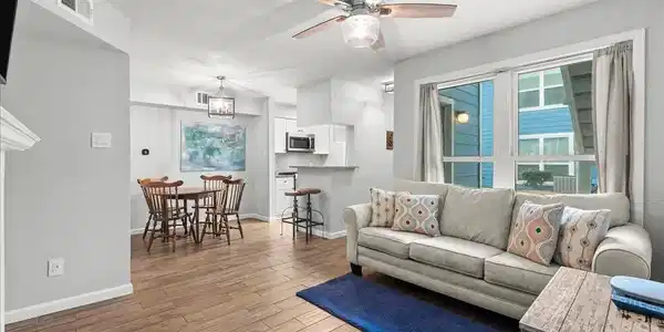 Image 3: Fully updated! Enjoy new tile floors, beautiful li