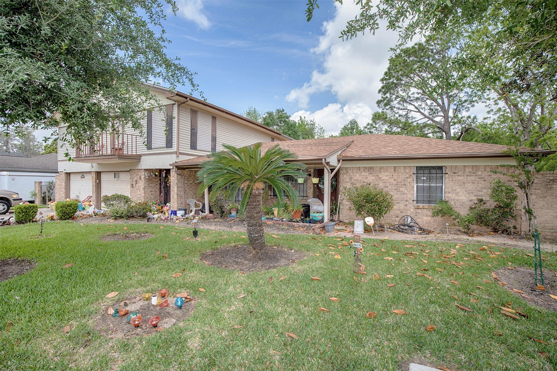Image 2: The lush landscaping gives this home great curb ap