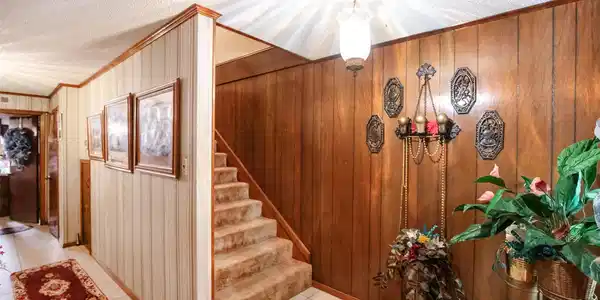 Image 3: The entryway features tile flooring with beautiful