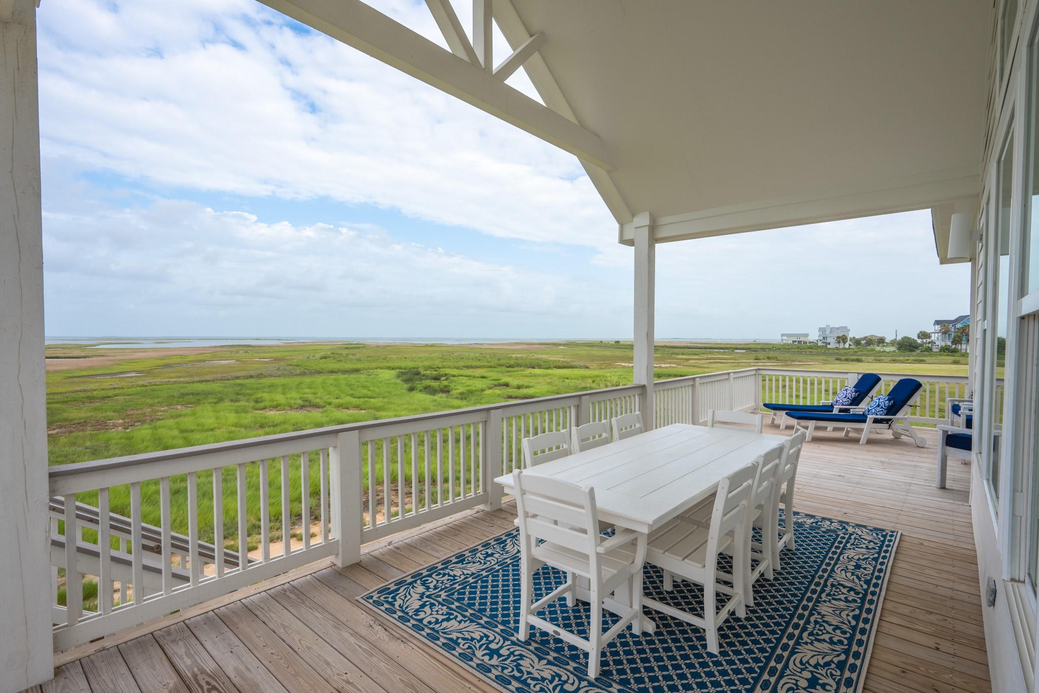 Image 3: Rear balcony with view of West Galveston Bay and u