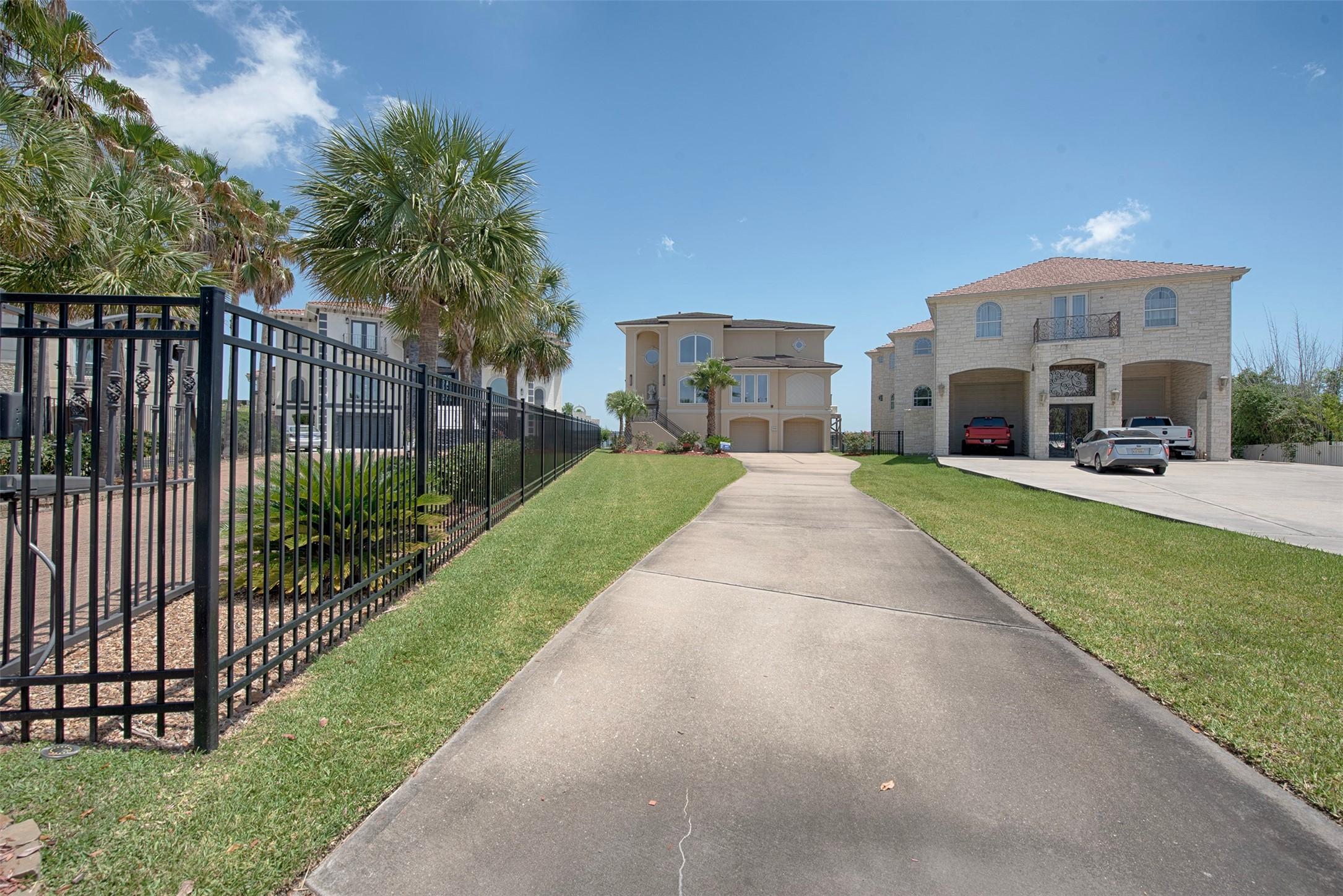 Image 4: A street view of the home showing the amazing long