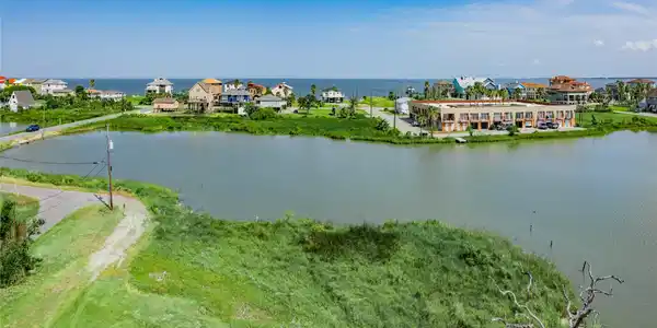 Image 4: This aerial photo showcases a picturesque waterfro