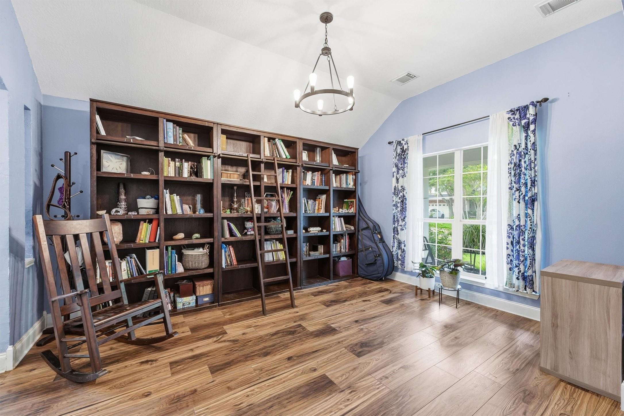 Image 4: Flexible front living space featuring abundant nat