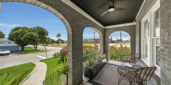 Image 2: The covered front porch provides a great vantage p