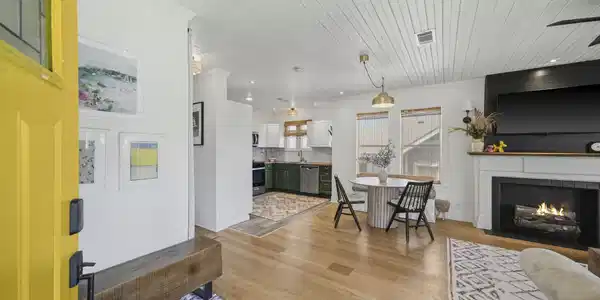 Image 3: Come on in and enjoy the interior's charm - hardwo