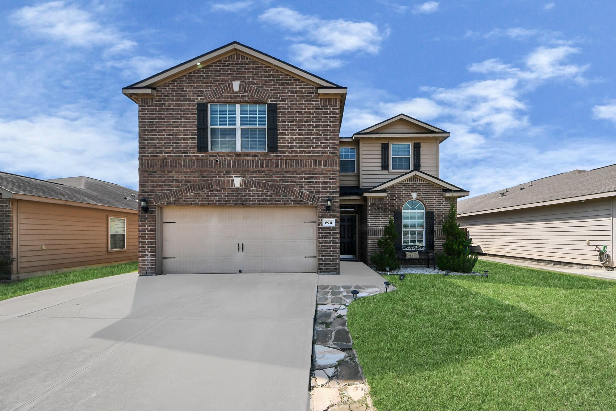 Image 2: This beautifully remodeled two-story home features