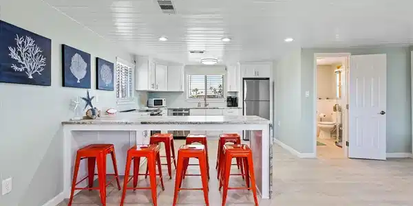 Image 3: Fully remodeled kitchen with extended seating