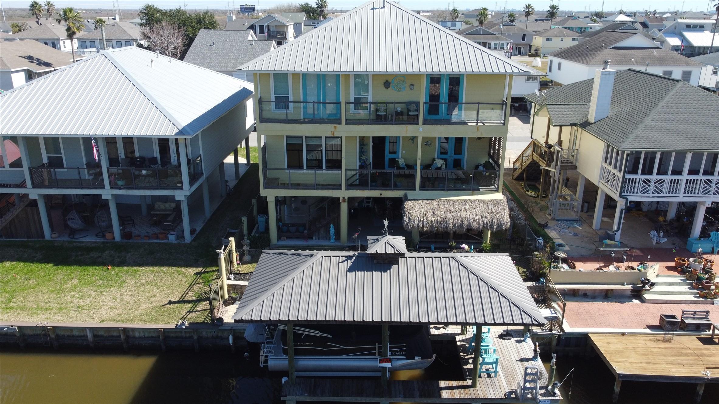 Image 1: View of the boathouse and waterside.