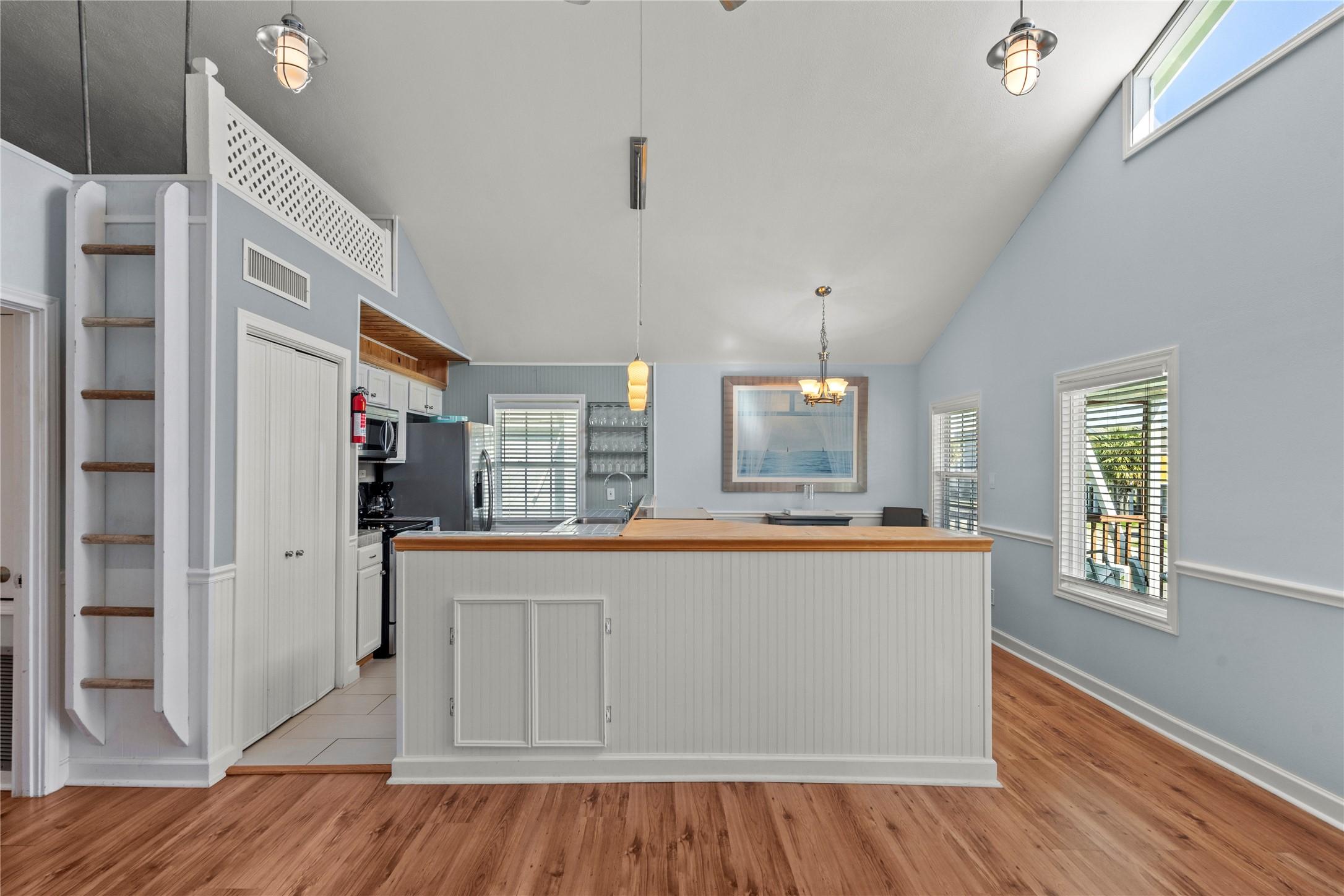 Image 1: The spacious kitchen serves as the heart of the ho