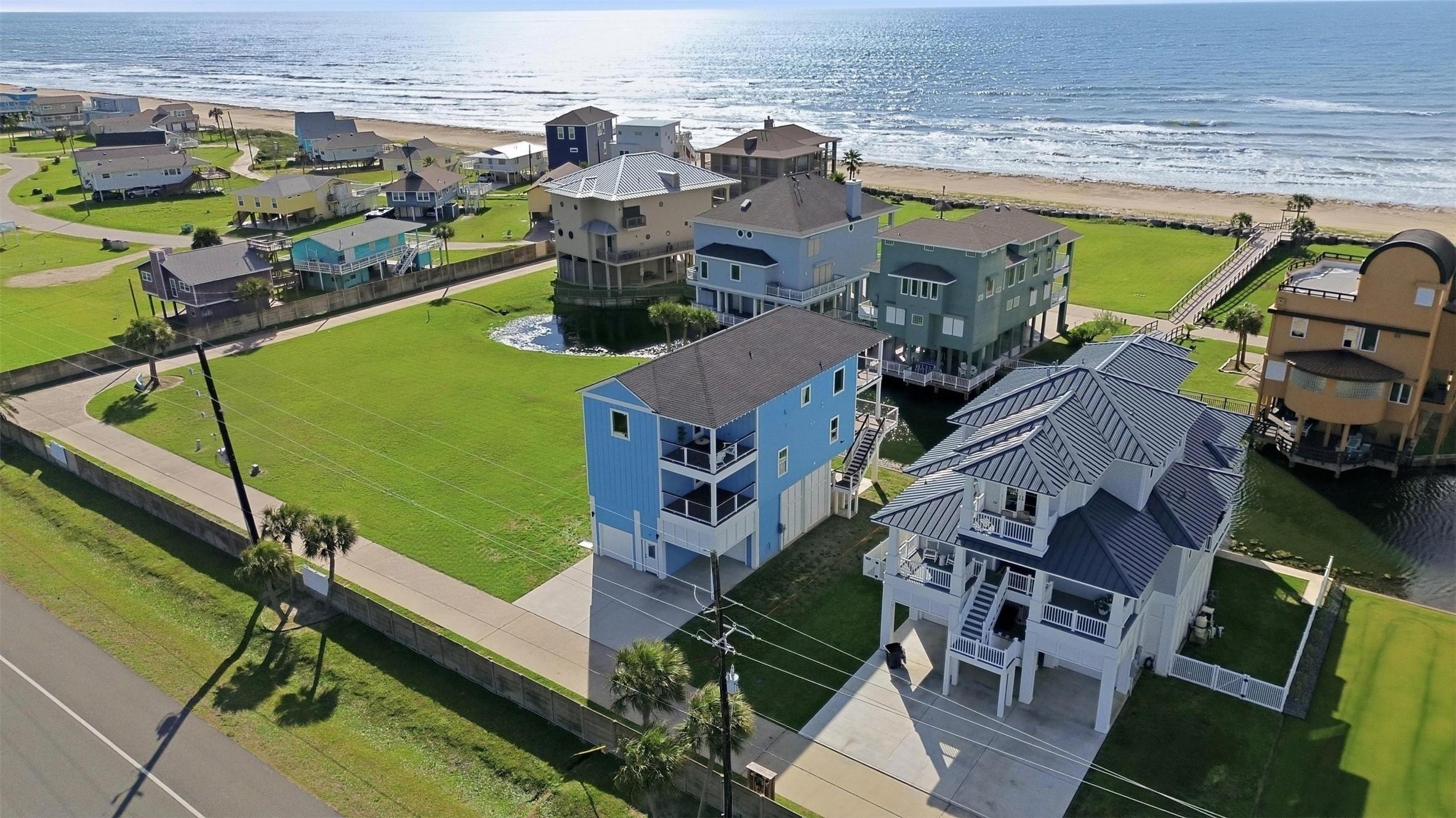 Image 1: The sand is just steps from your home