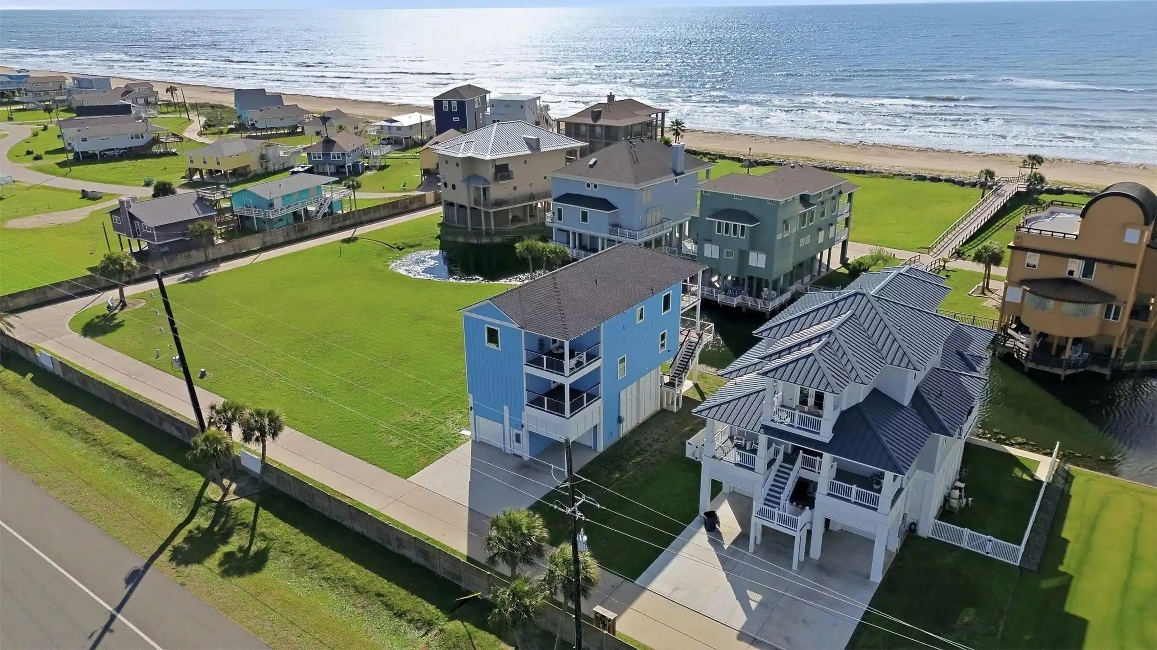 Image 1: The sand is just steps from your home