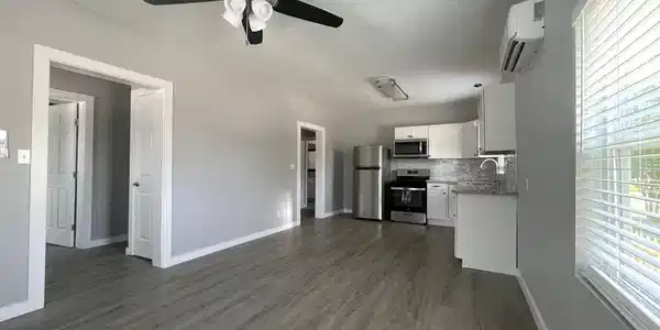 Image 2: Living Room Open to Kitchen
Step into an OPEN, AI