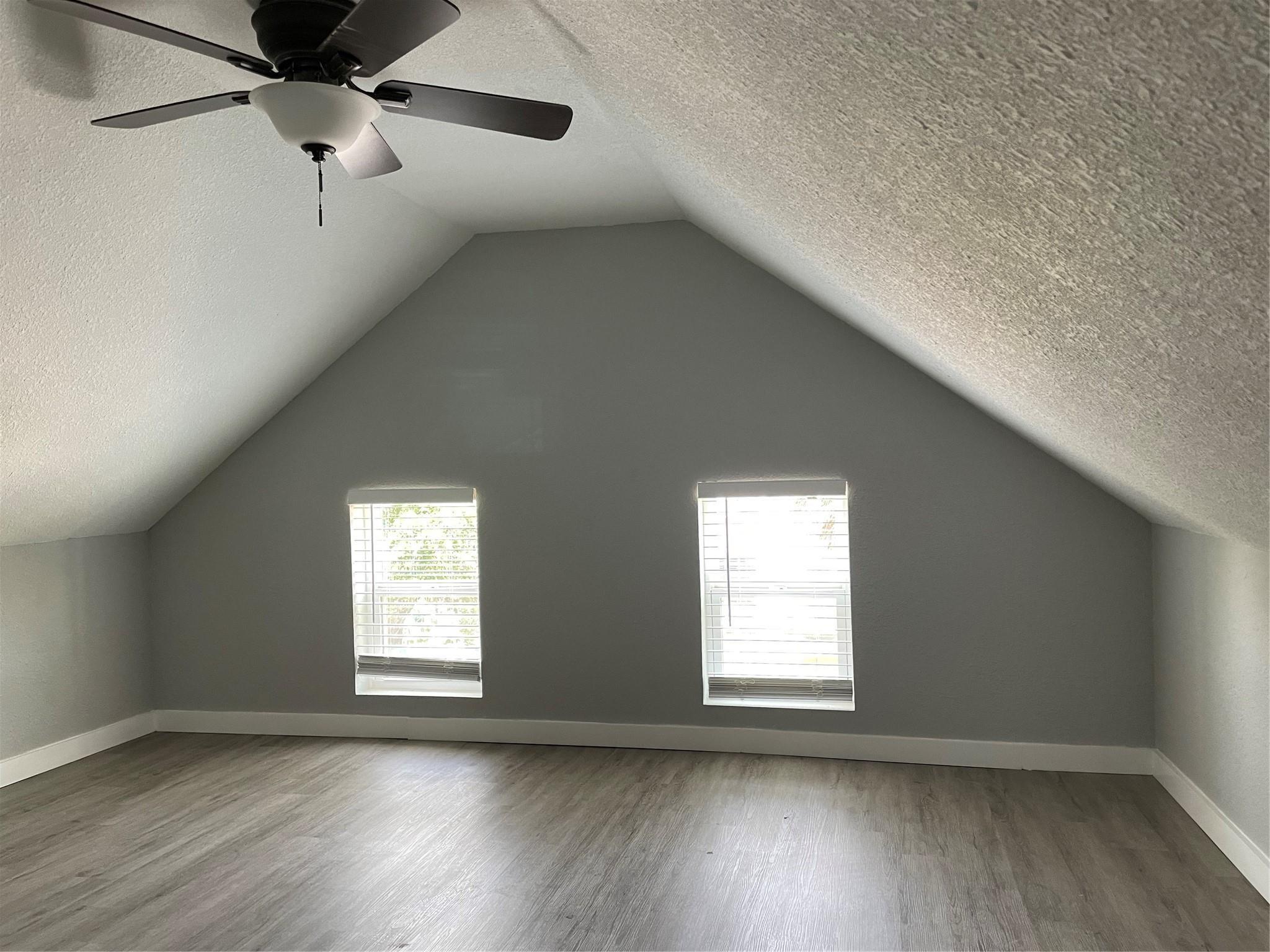 Image 3: Bathed in NATURAL LIGHT, this elevated space feels