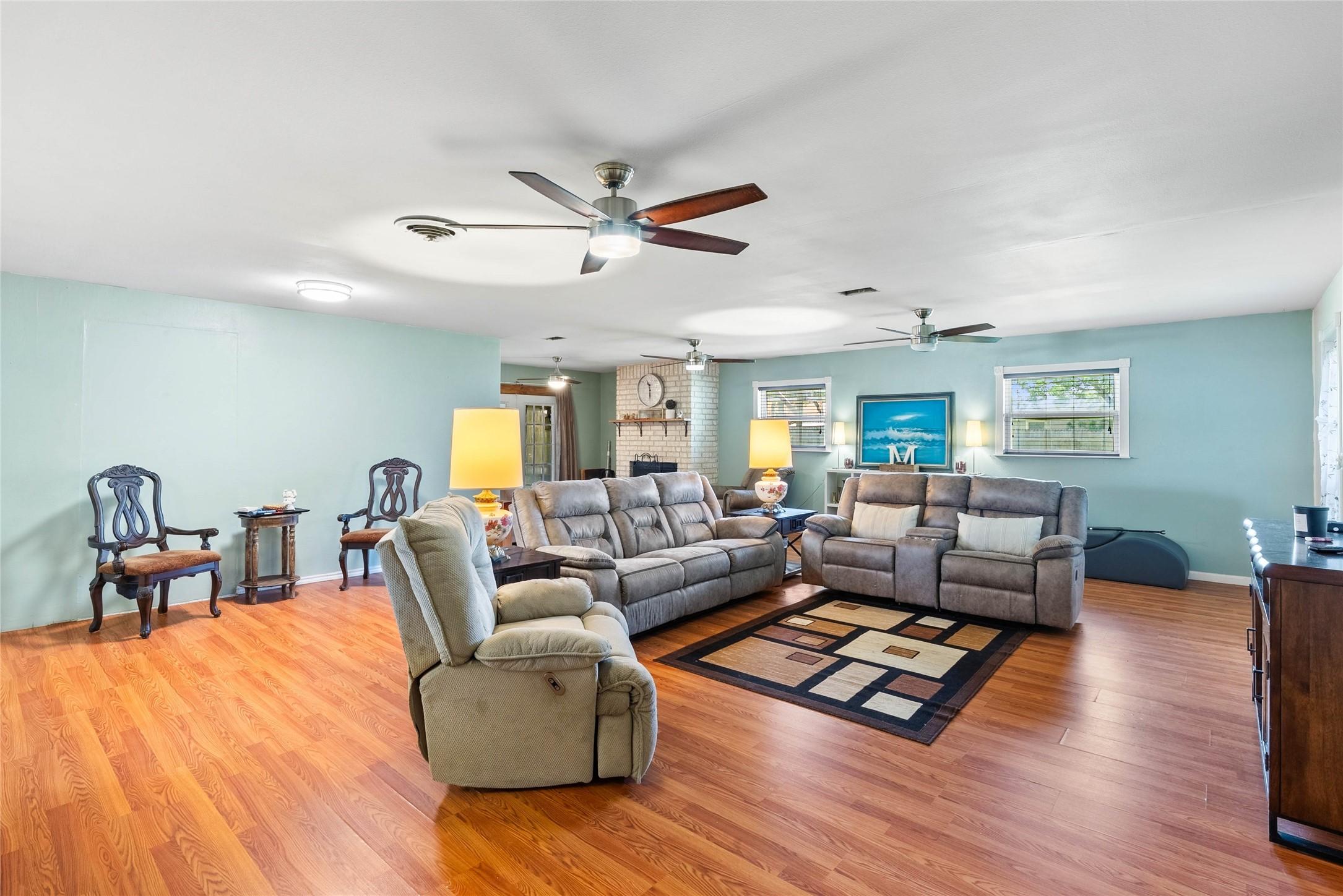 Image 4: Expansive main living room boasting beautiful hard