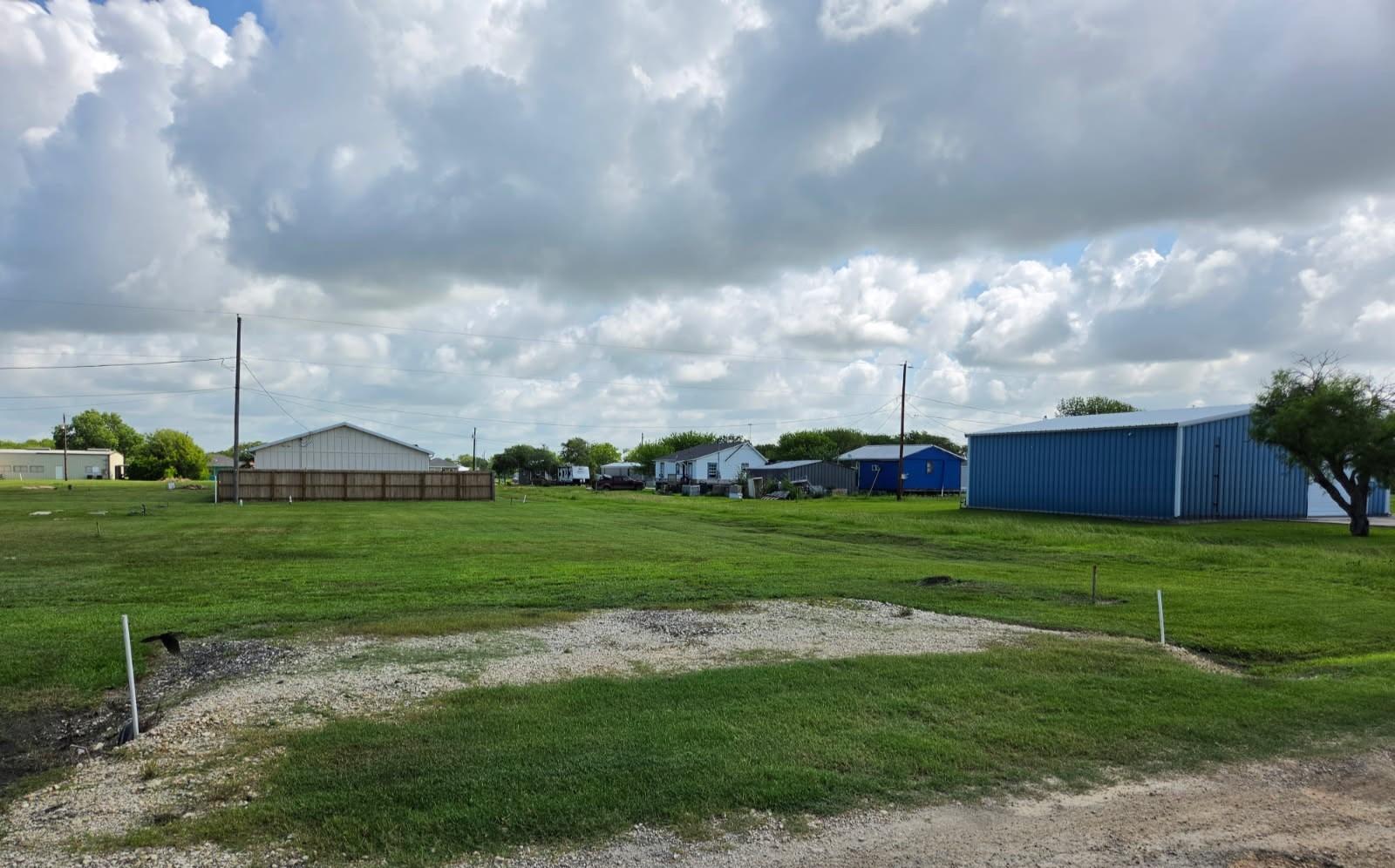 Image 1: Street view at culvert.
