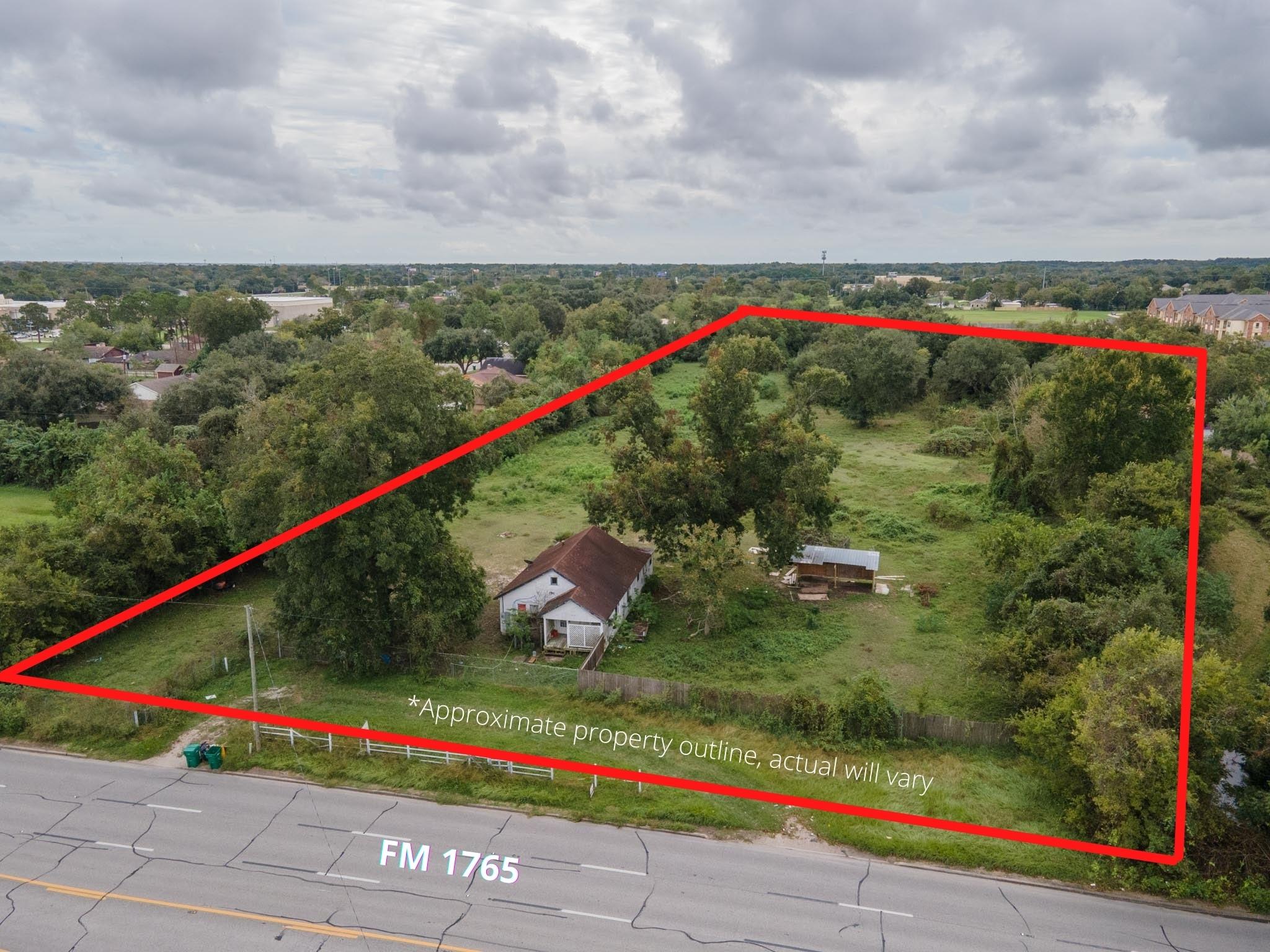 Image 1: The home sits a nice distance from the road on the