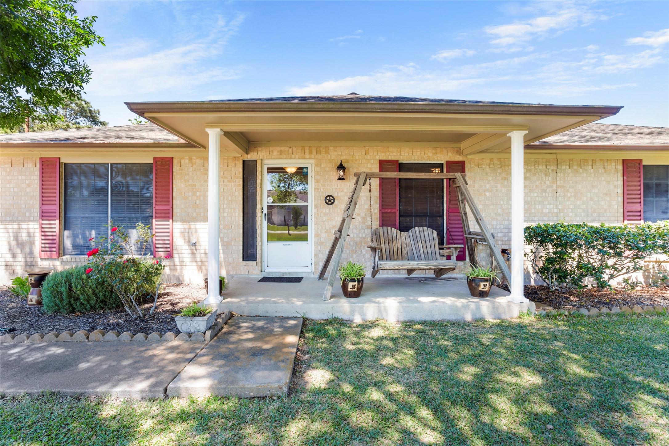 Image 2: Enjoy serene moments on the charming front porch,