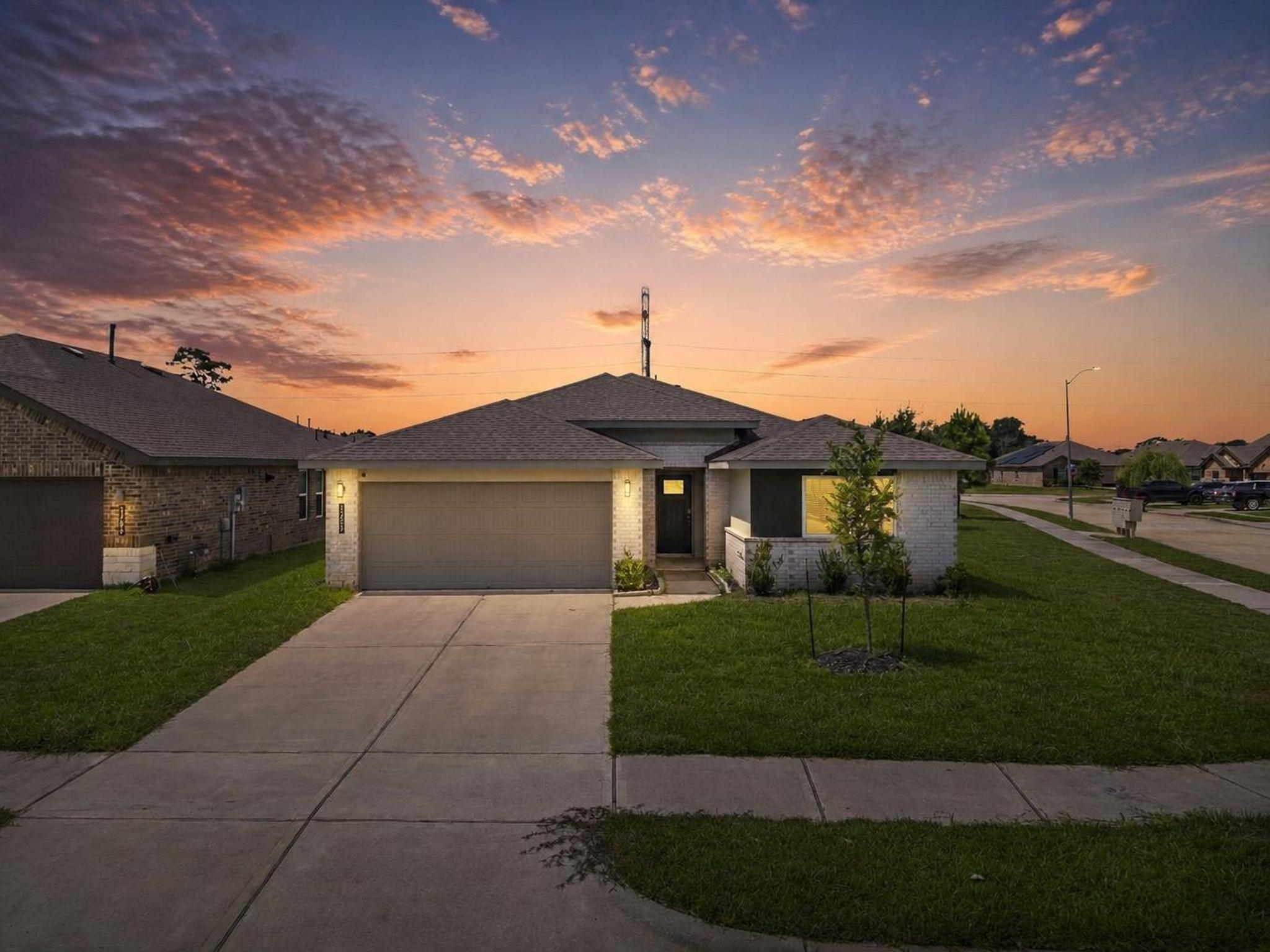 Image 1: The front exterior introduces a clean, contemporar