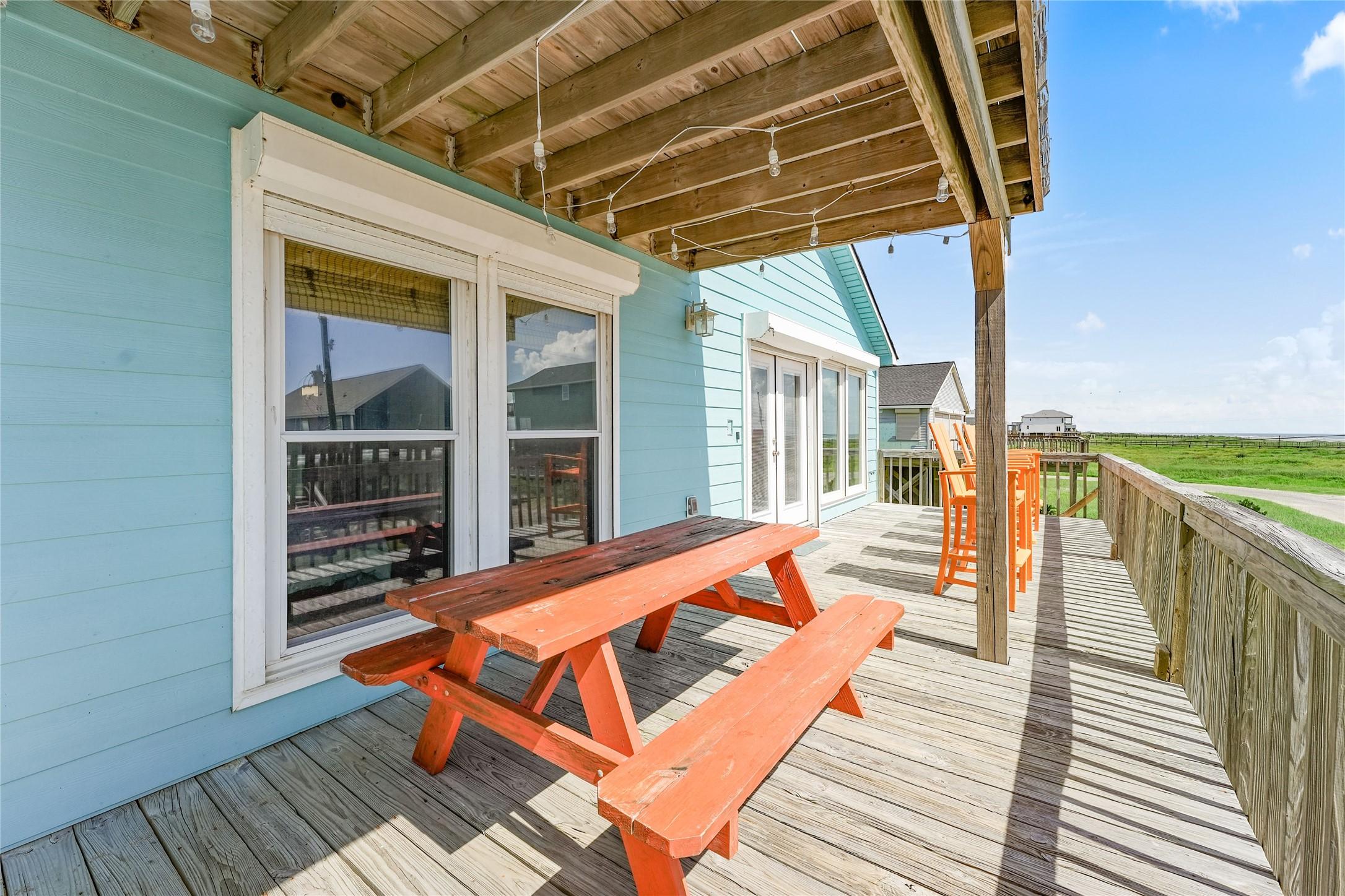 Image 2: Spacious main level deck with three additional dec