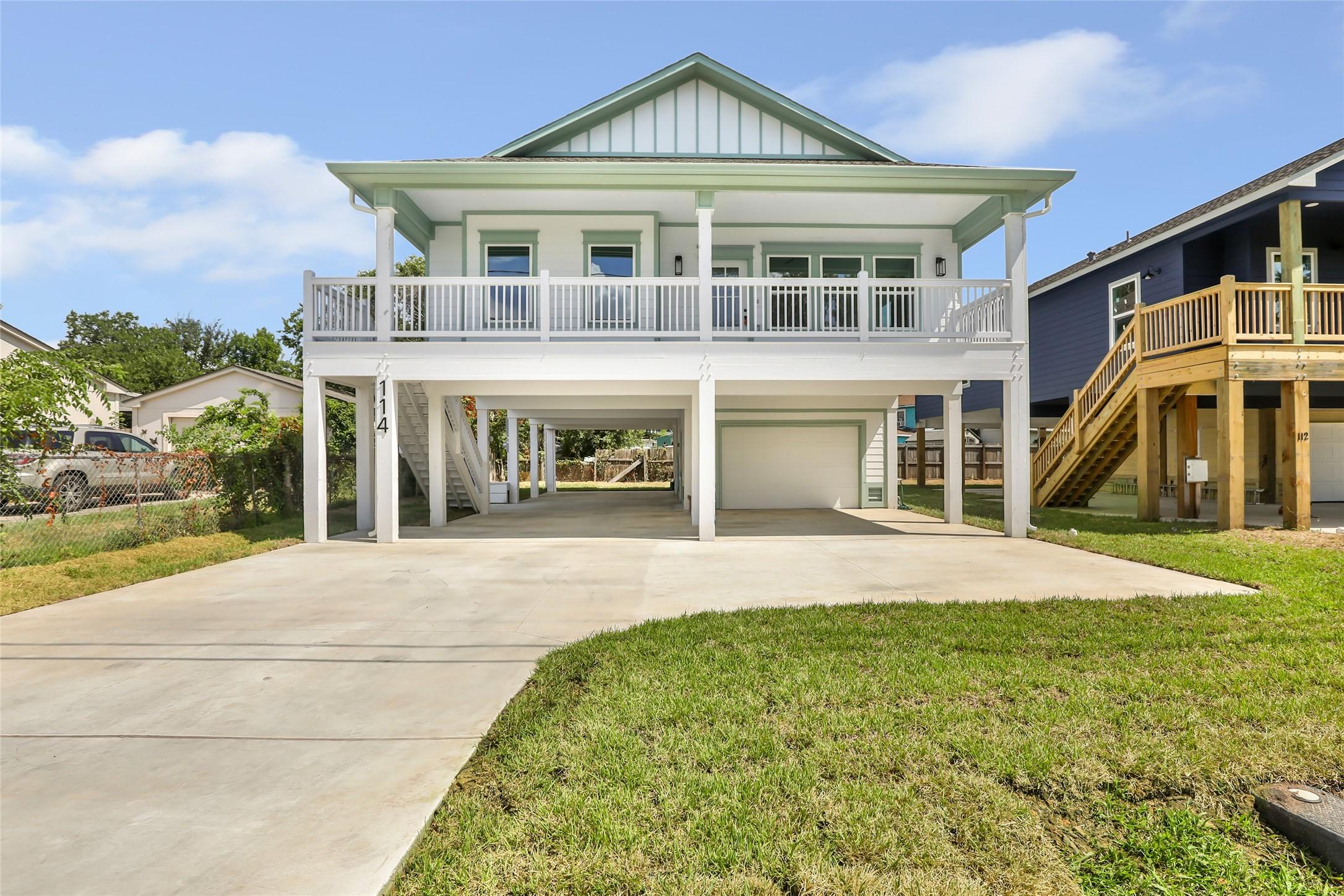 Image 1: Charming elevated home with a spacious balcony, of