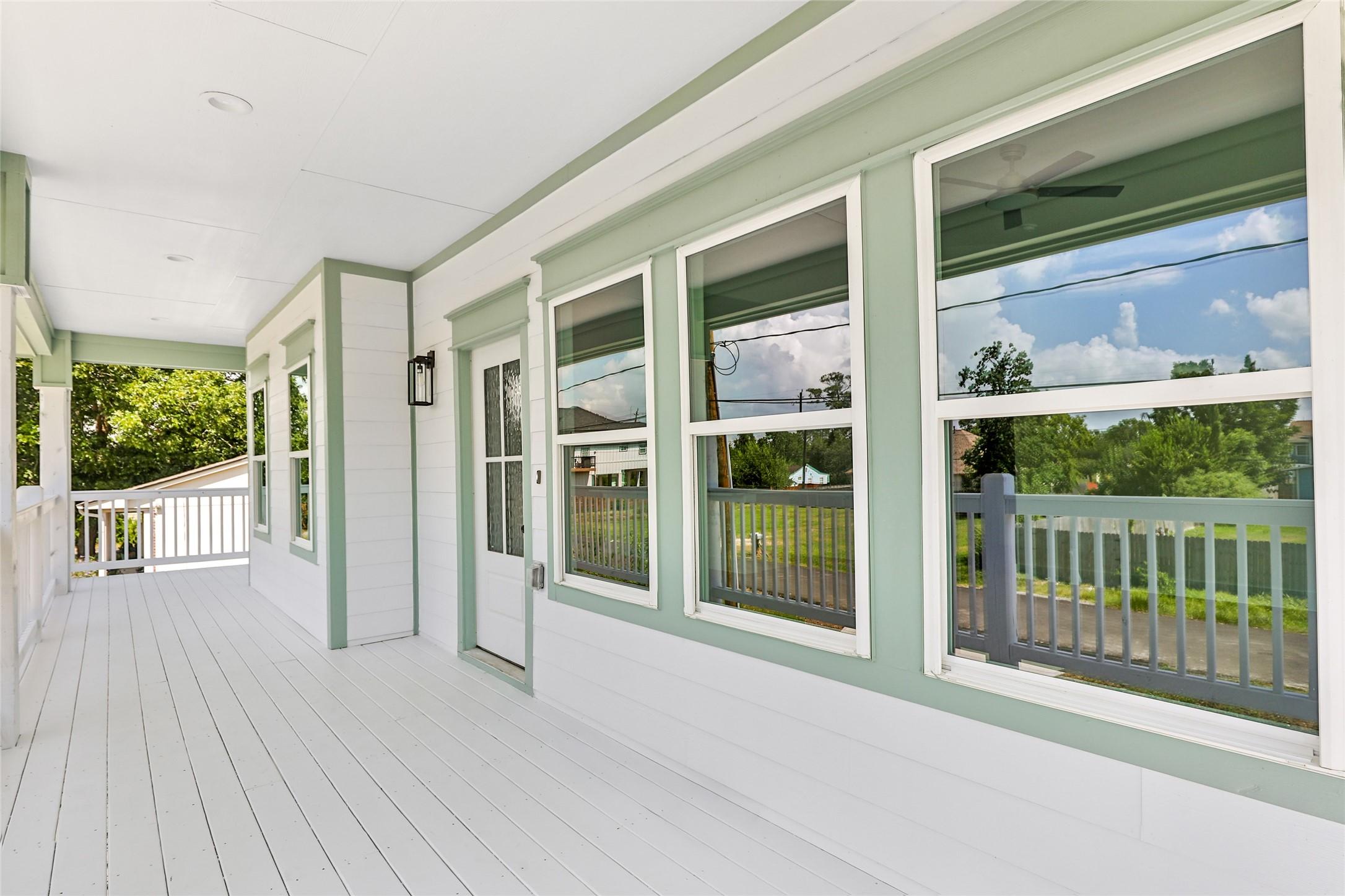 Image 2: Covered deck. Plenty of room to enjoy the bay bree
