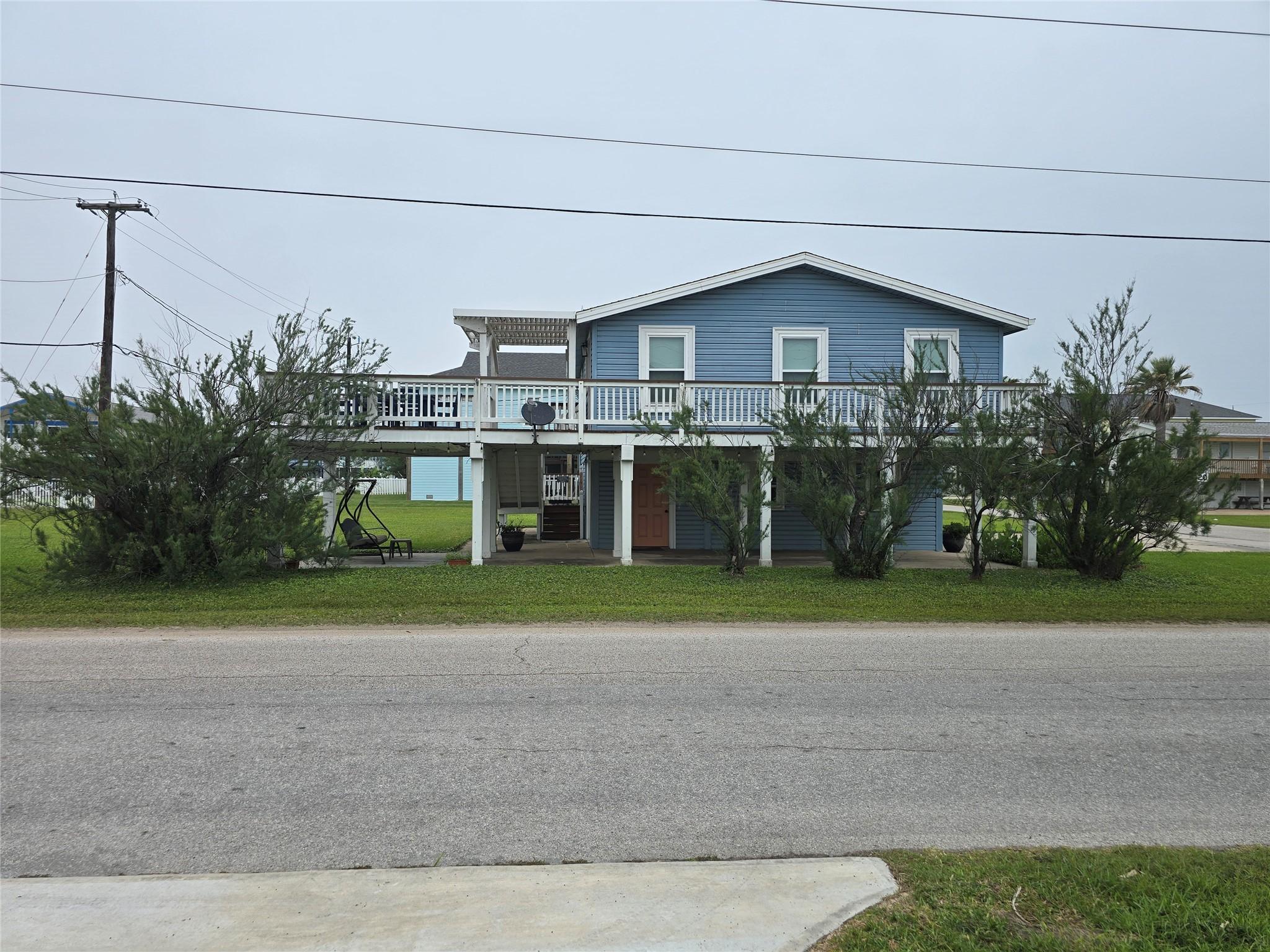 Image 1: Front view of home