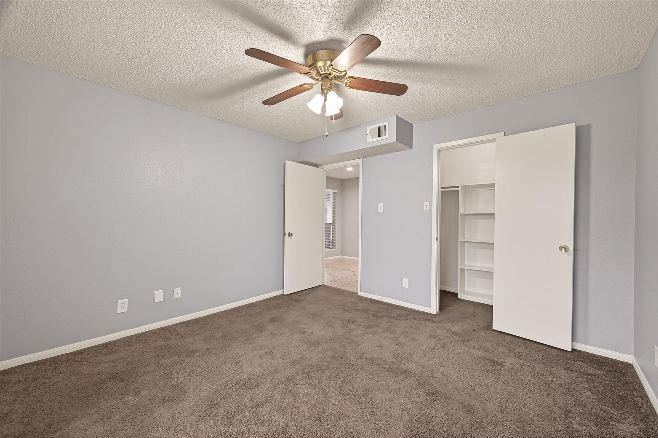 Image 4: Your bedroom has cozy soft carpet.