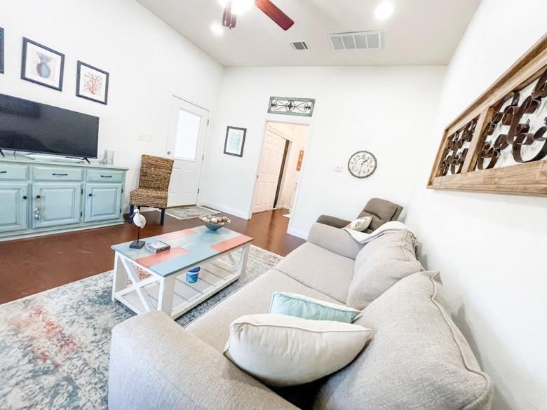 Image 4: Additional view of the living area. Exit door lead
