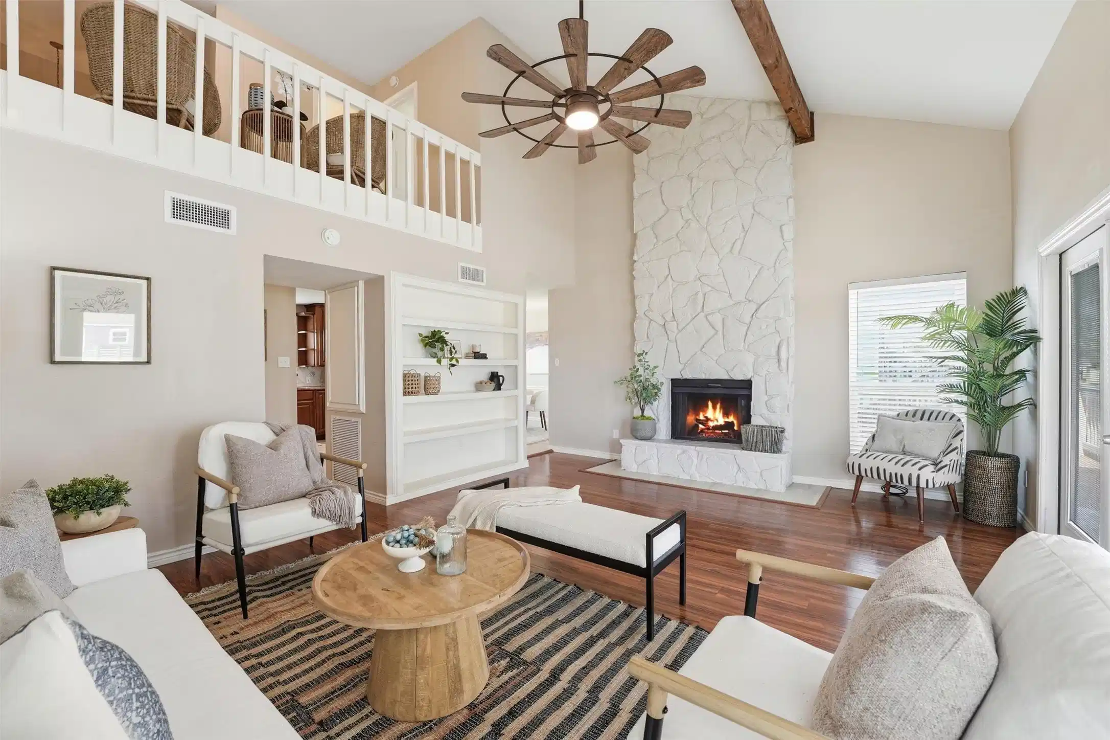 Image 1: The dramatic ceilings, exposed beam accents, and l